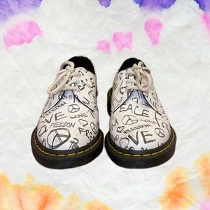 “Peace,Love,Freedom.” White oxford Docs